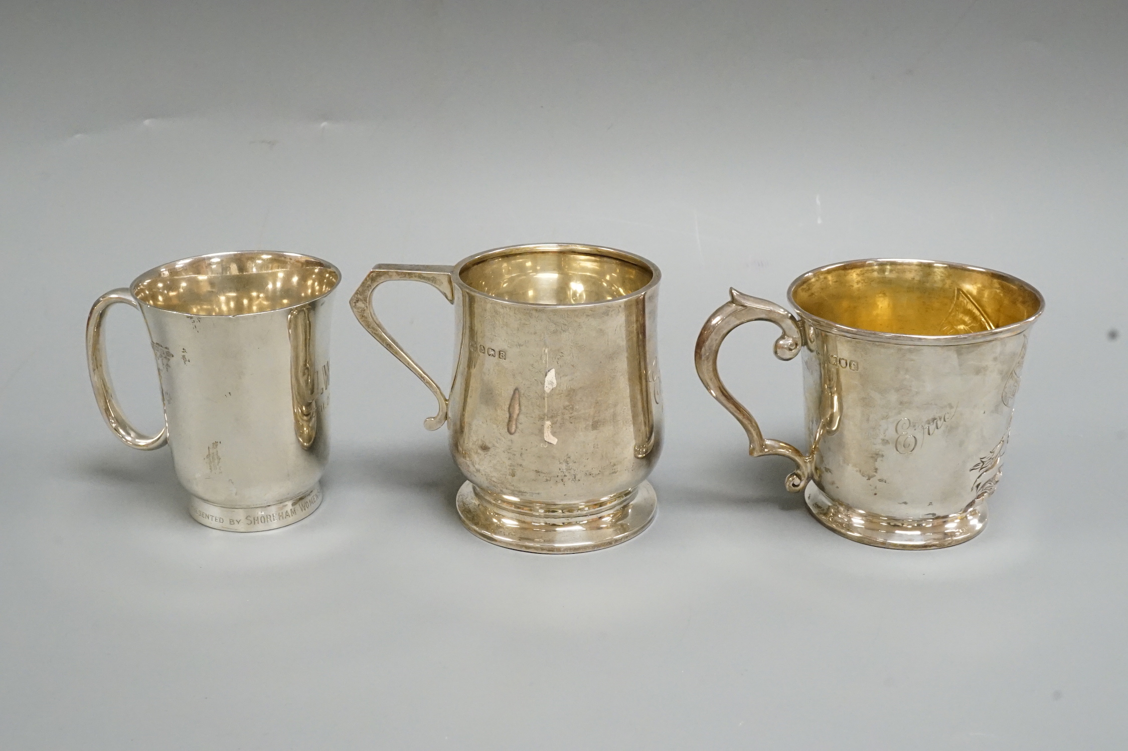 Three assorted silver christening cans, tallest, Birmingham, 1926, 8cm, 10.1oz.